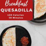 Breakfast Quesadillas on a black plate.