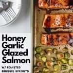 Honey Garlic Glazed Salmon with Roasted Brussel Sprouts on a white plate