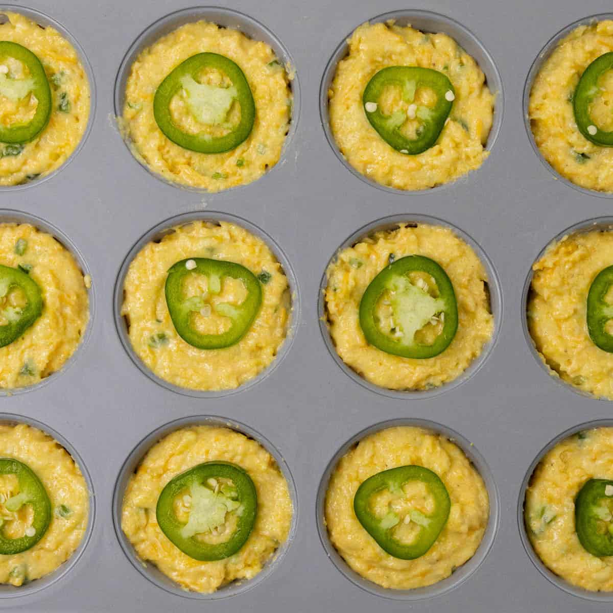 Jiffy Jalape&ntilde;o Cornbread Muffins batter in muffin tin