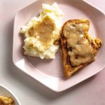 Skillet Chicken with Mashed Potatoes and Gravy on a plate