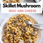 Creamy Skillet Mushroom Mac and Cheese piled on a plate. Next to it is a cheese grader with cheese and a napkin.
