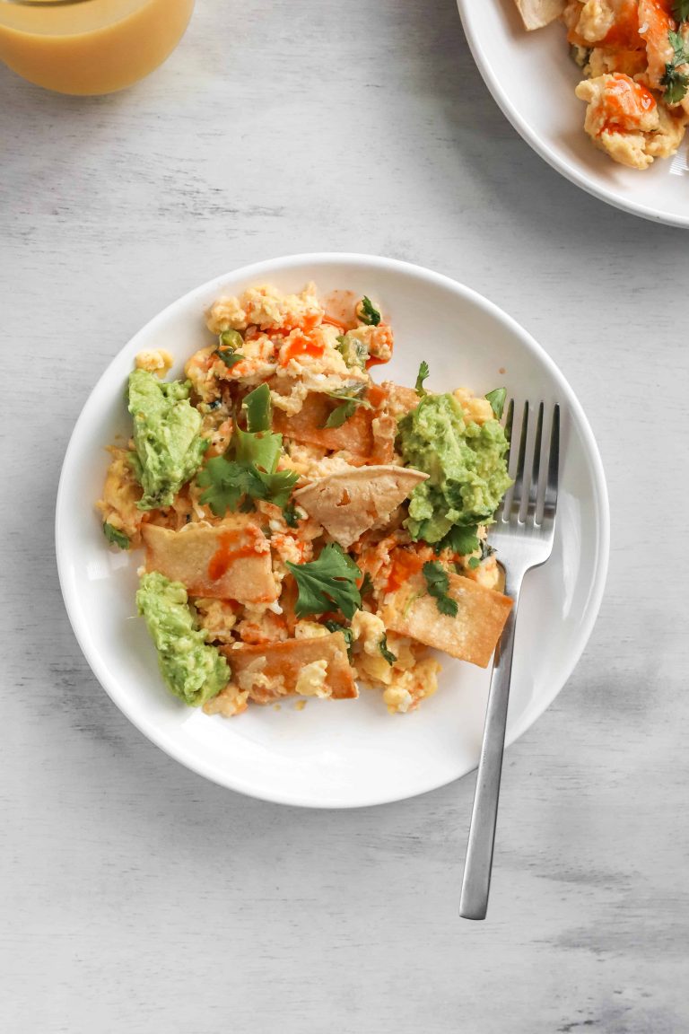 Migas woth hot sauce and smashed avocado