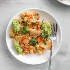 Migas woth hot sauce and smashed avocado