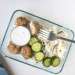 Greek Turkey Meatballs with Rice in a meal prep container