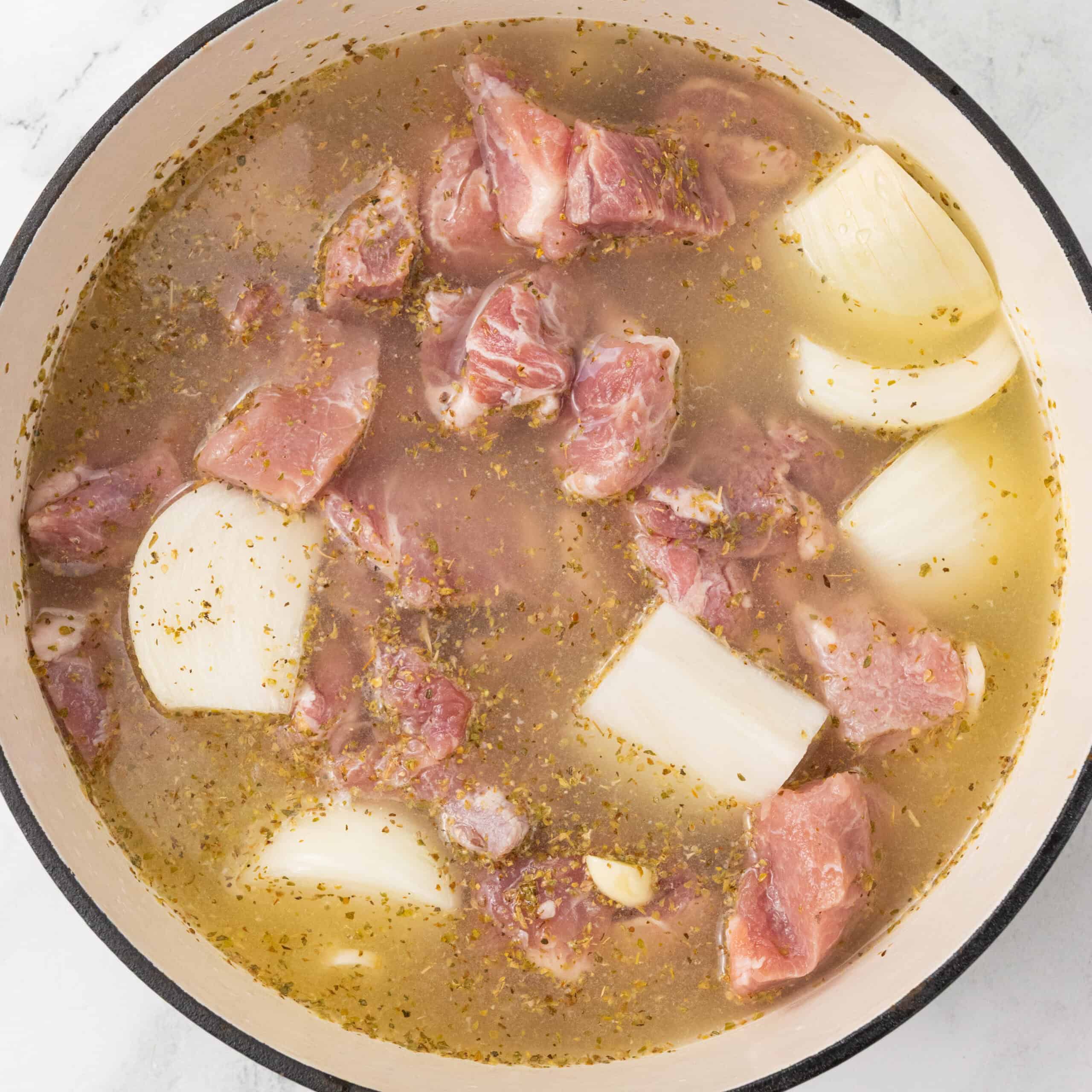 Juicy Pork Carnitas in a stovetop dutch oven