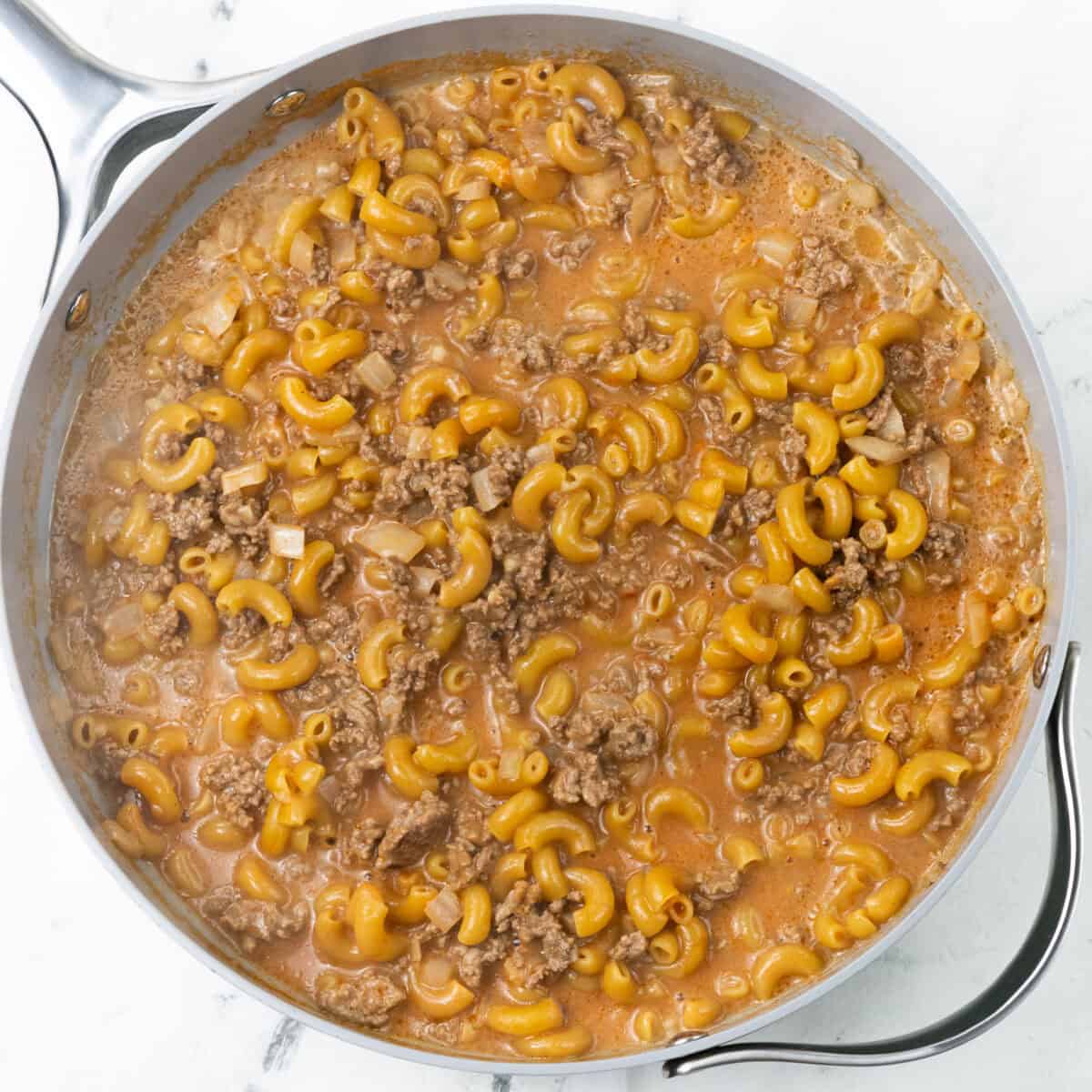 cooking pasta for Cheeseburger Hamburger Helper