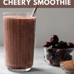 Chocolate Cherry Smoothie with cherries in the back ground
