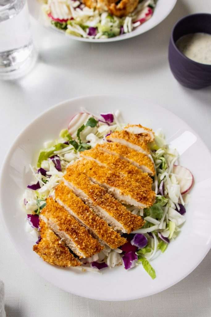 Air Fry Chicken on a salad- chicken cutlets in air fryer
