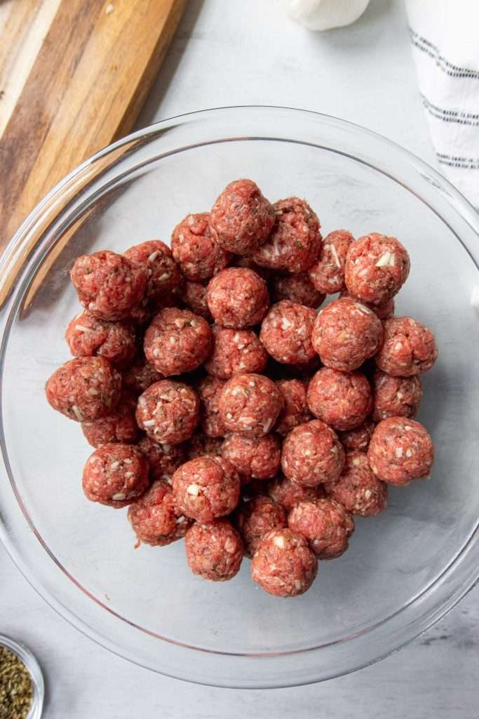 raw mini meatballs in a bowl