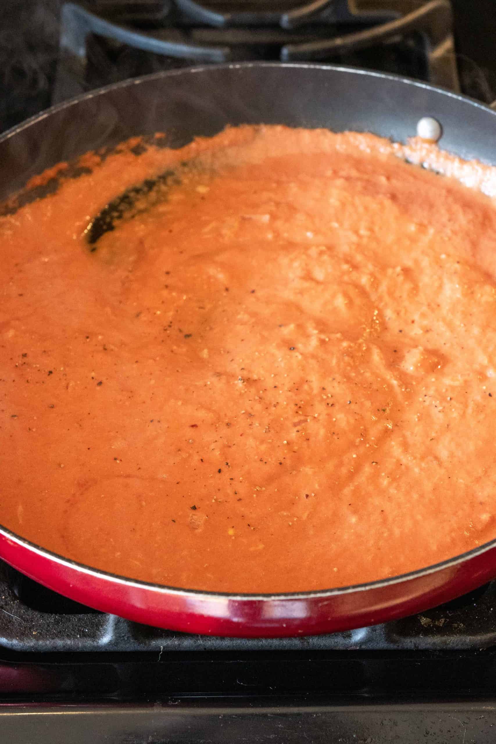 pink pasta sauce in pan