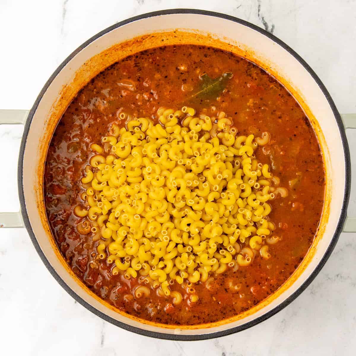 pasta in pot with sauce for American goulash
