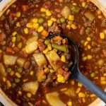 Cowboy Soup with ladle scooping out soup