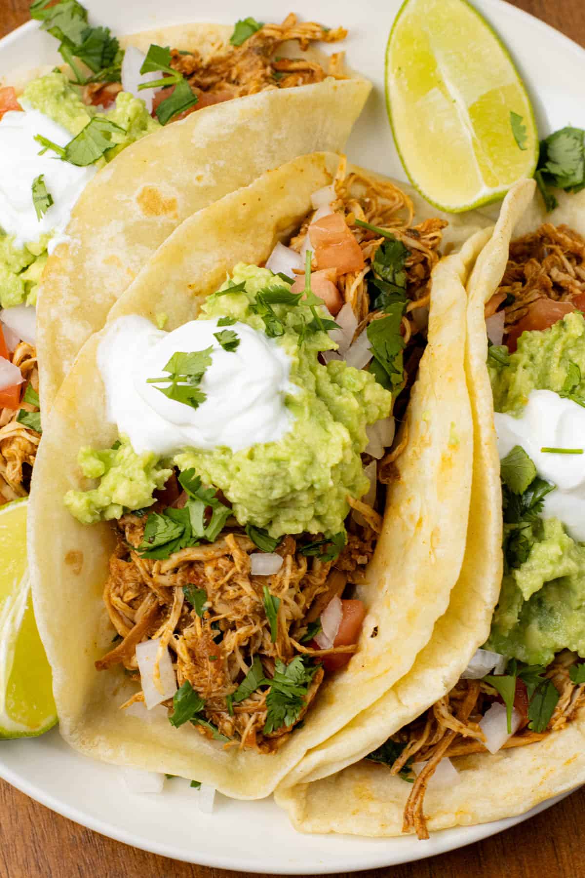 slow cooker chicken tacos on a plate