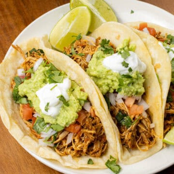 slow cooker chicken tacos on a plate