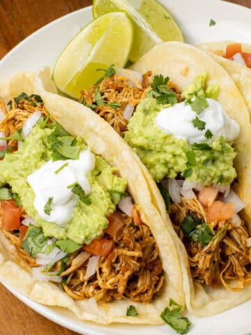 slow cooker chicken tacos on a plate