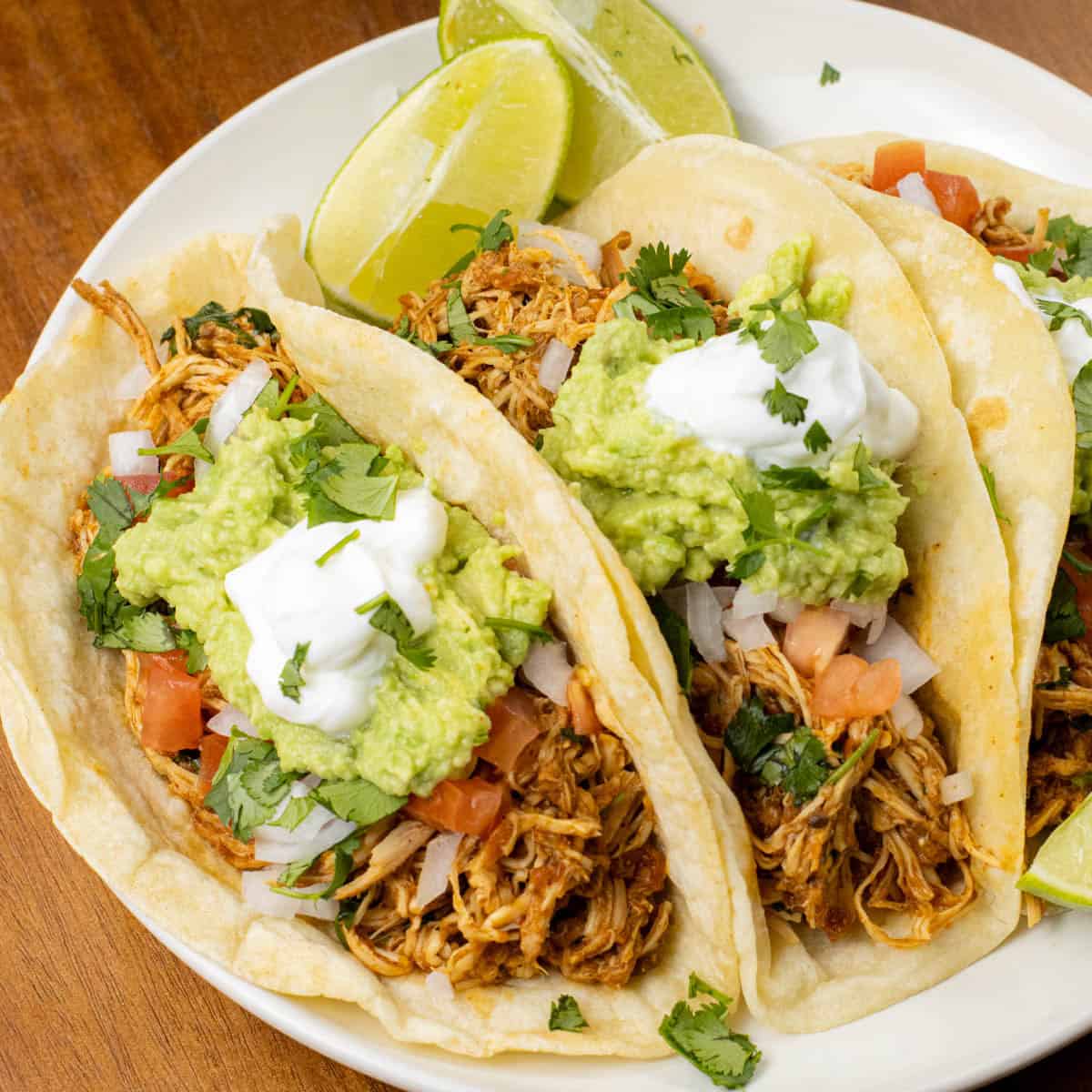 slow cooker chicken tacos on a plate