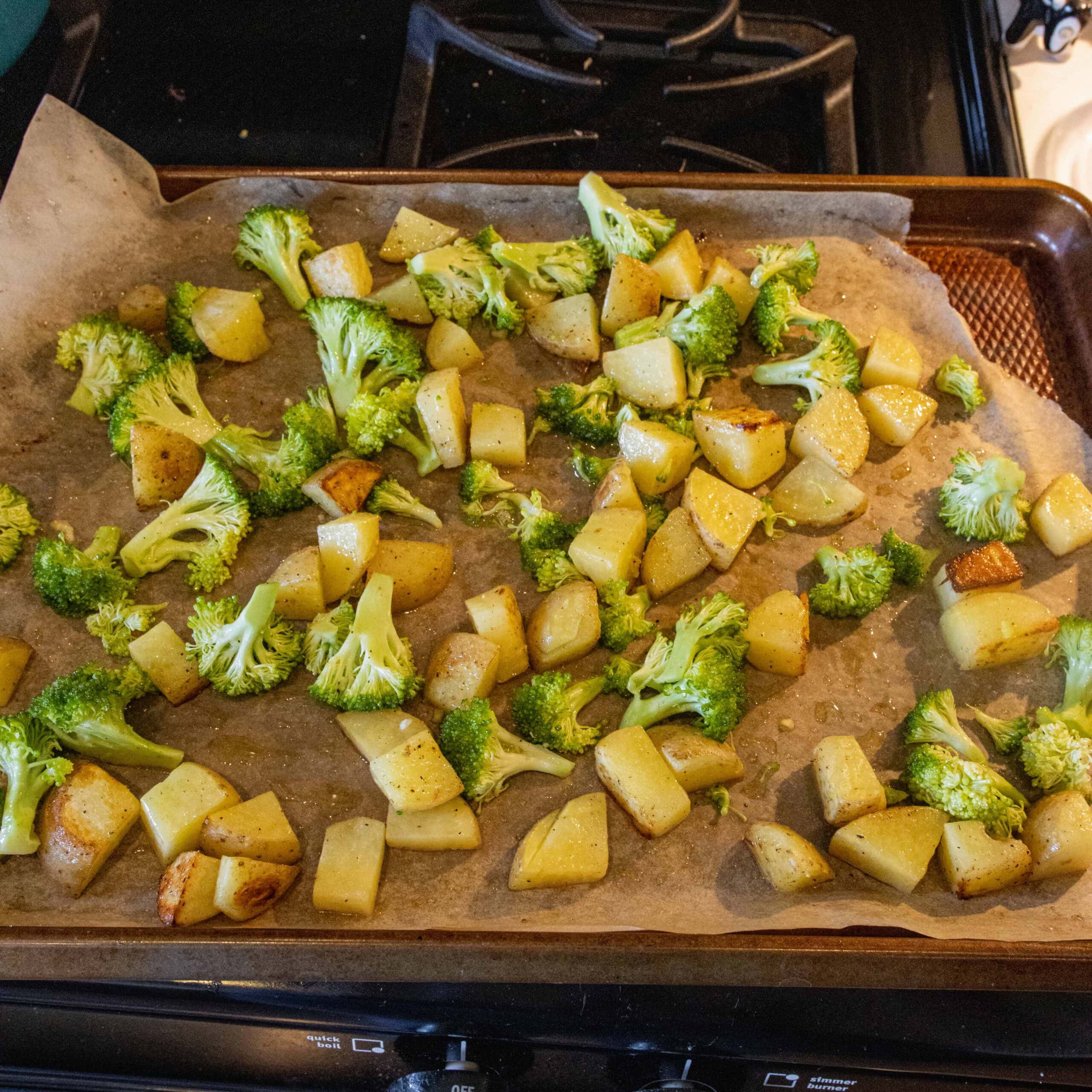 potatoes and broccoli on a sheet pan