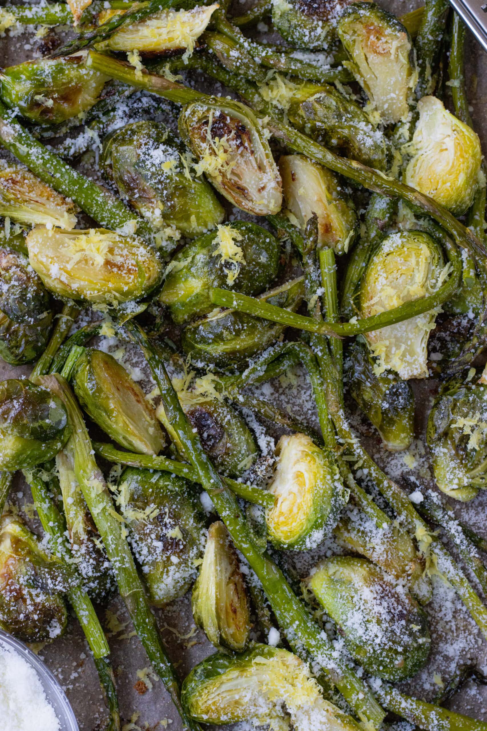 asparagus and brussels sprouts on sheet pan