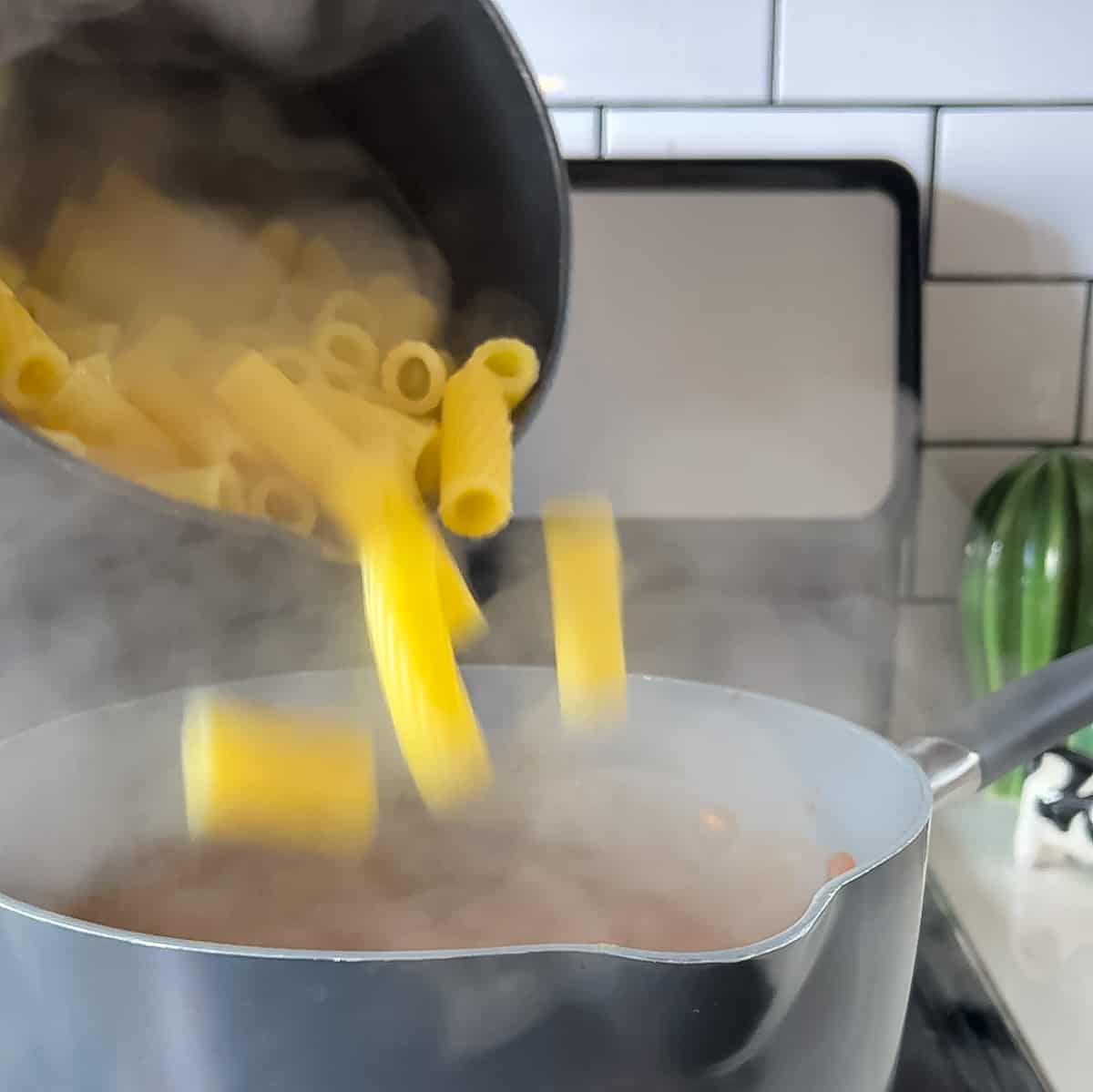 add pasta to sauce