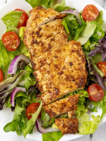 Thin Chicken cut and on a Salad