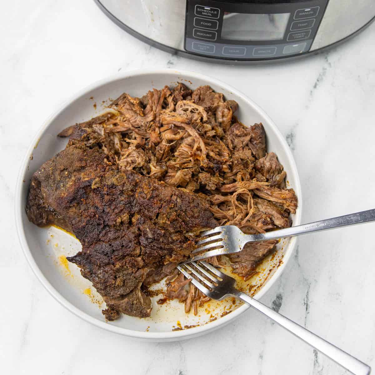 Shredded Beef with forks