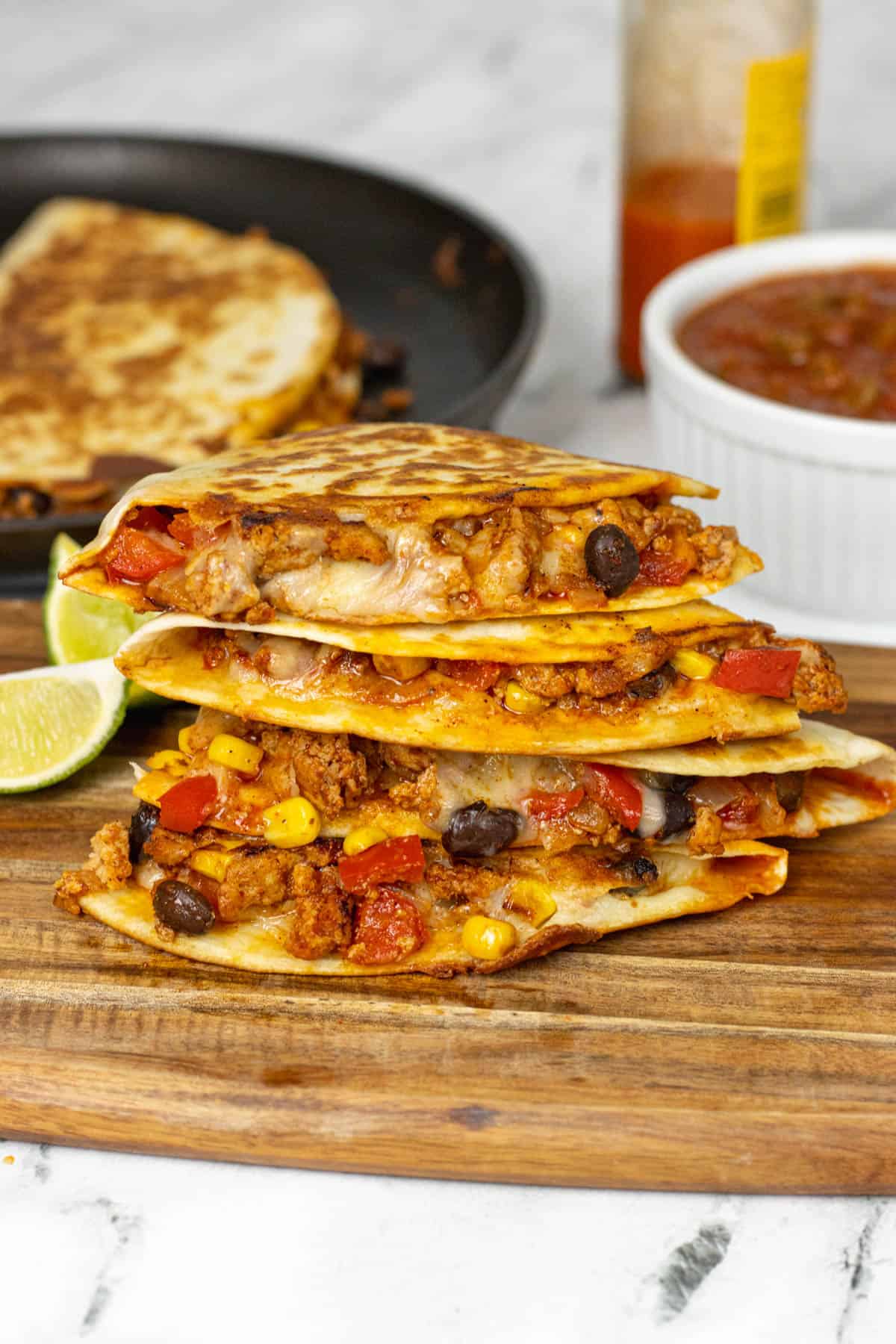 Ground turkey quesadillas stacked on top of each other