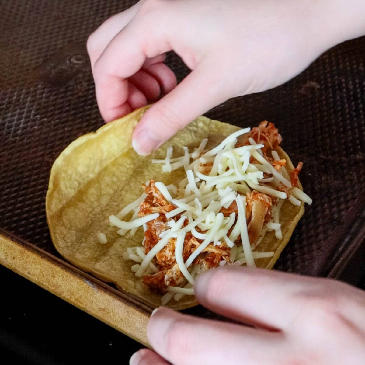 filling and folding tacos