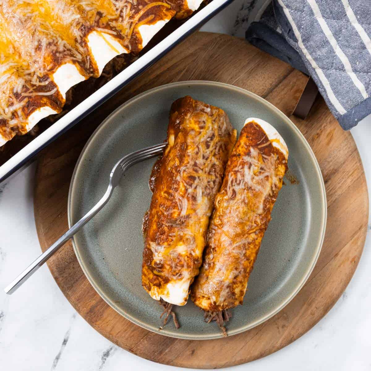 Shredded Beef Enchiladas Pan and Plates