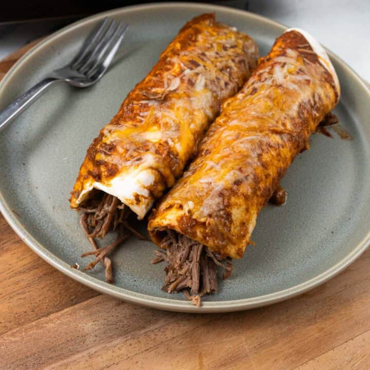 Shredded Beef Enchiladas Plated
