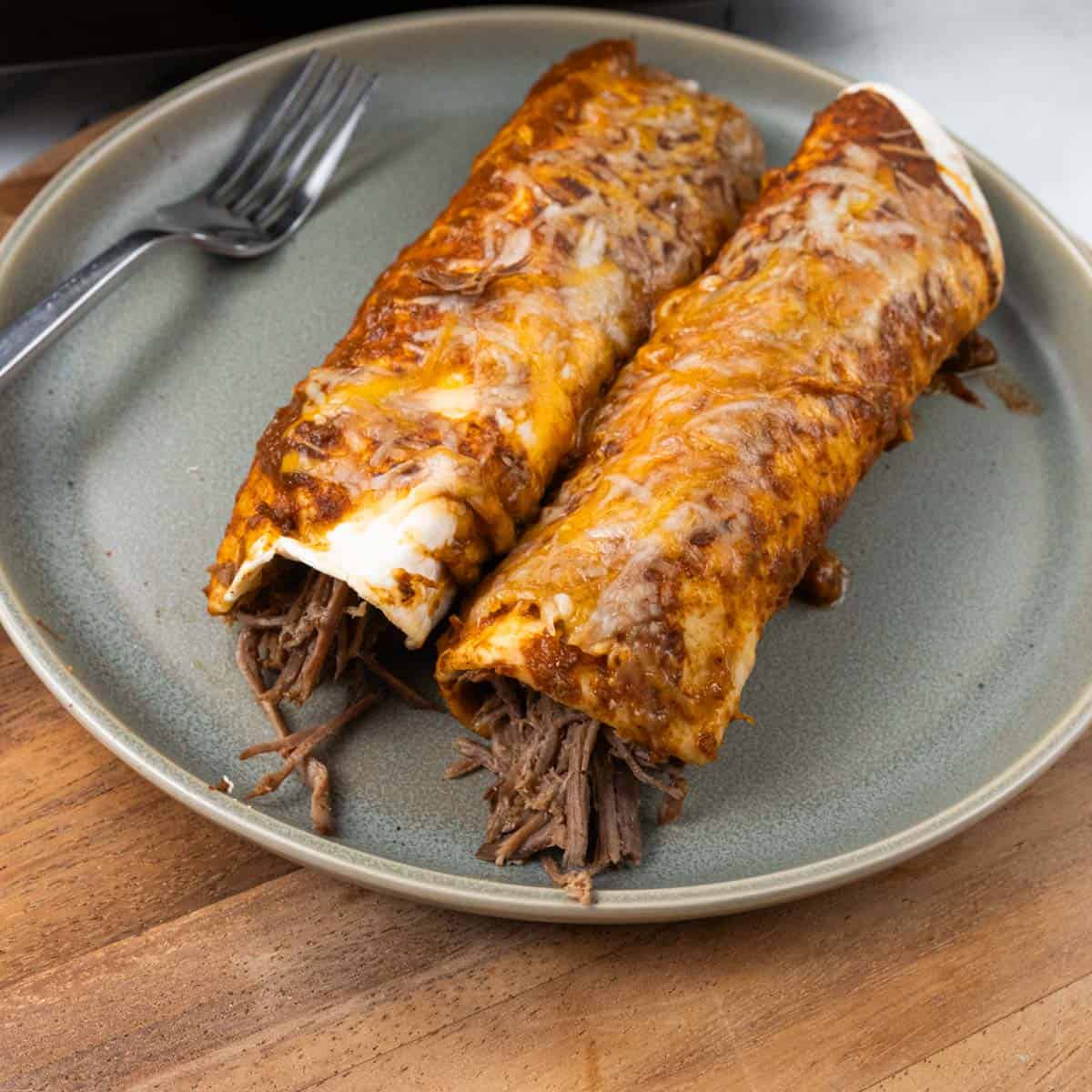 Shredded Beef Enchiladas Plated
