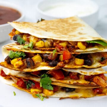Black Bean Quesadillas stacked on top of each other