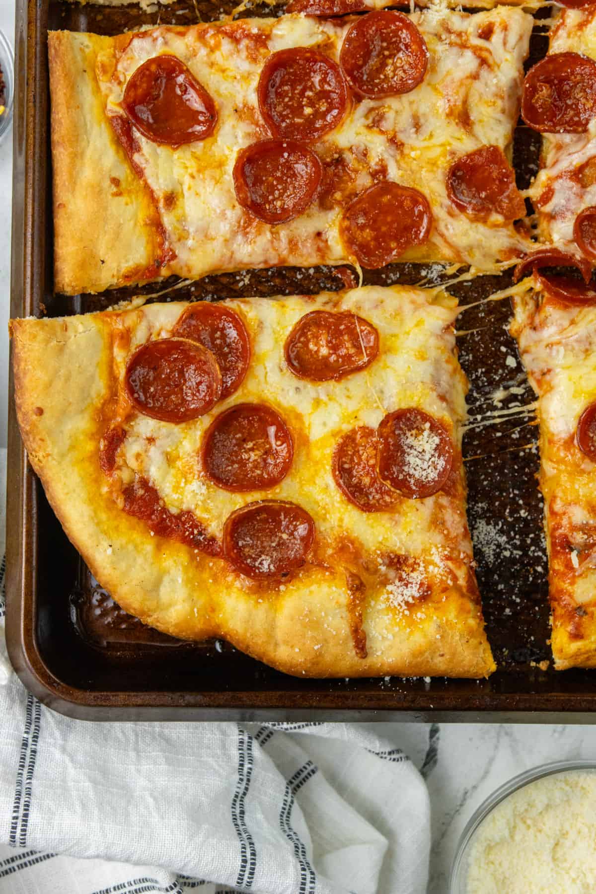Sheet Pan Pizza with a nice cheese pull