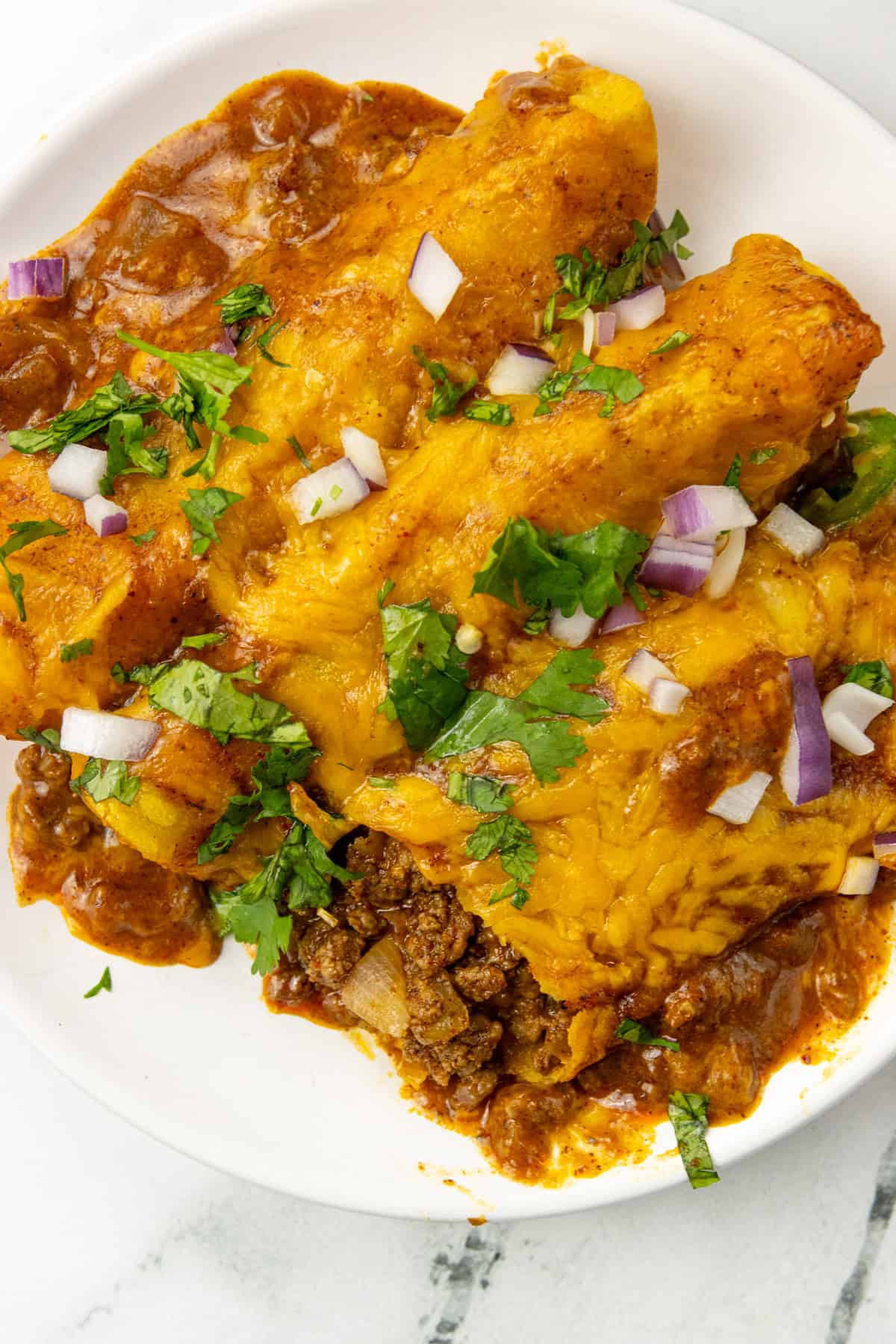 Ground Beef Enchiladas on a plate