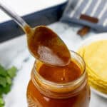 Red Enchilada Sauce with spoon in it
