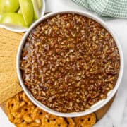 Pecan Pie Dip with pretzels, graham crackers, and apples