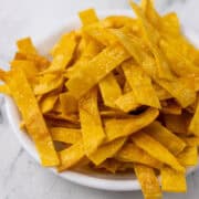 baked tortilla strips in a bowl