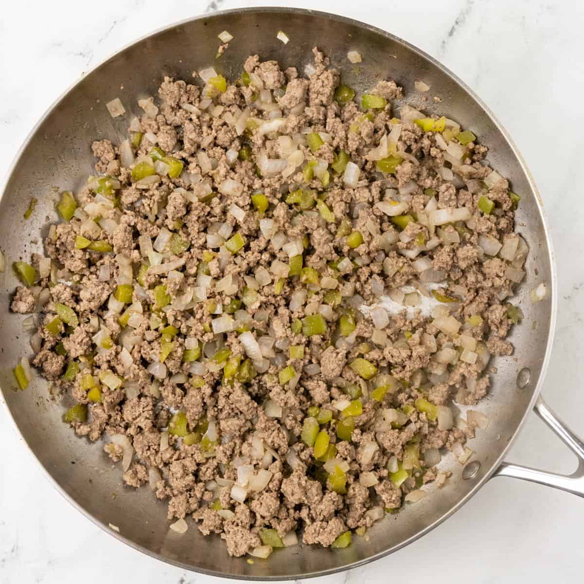 cooked beef filling in a skillet