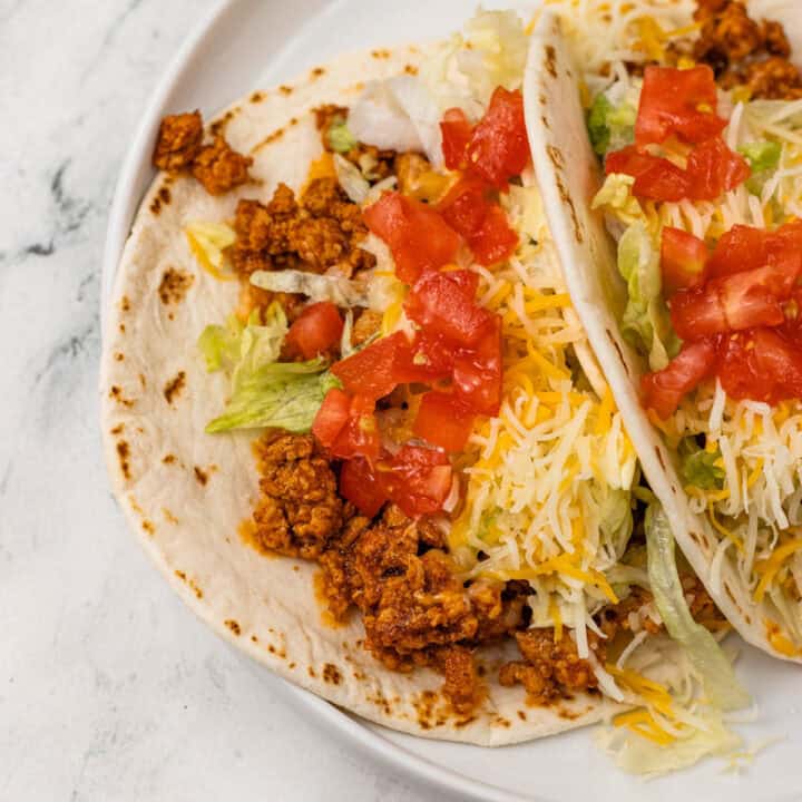 ground chicken tacos on plate