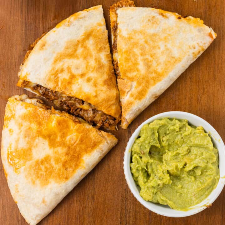 ground beef quesadillas served with guacamole