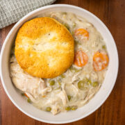 overhead view of chicken pot pie with biscuit
