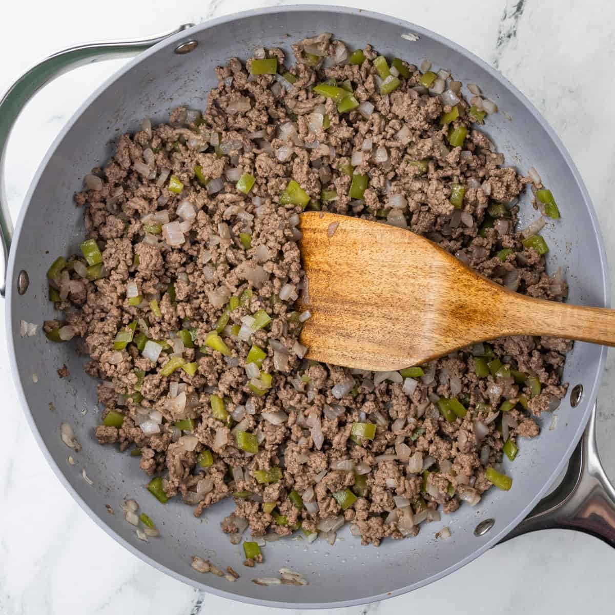 One-Pot Chili Mac and Cheese cooking meat
