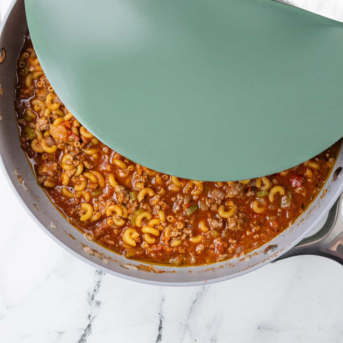 macaroni cooking One-Pot Chili Mac and Cheese