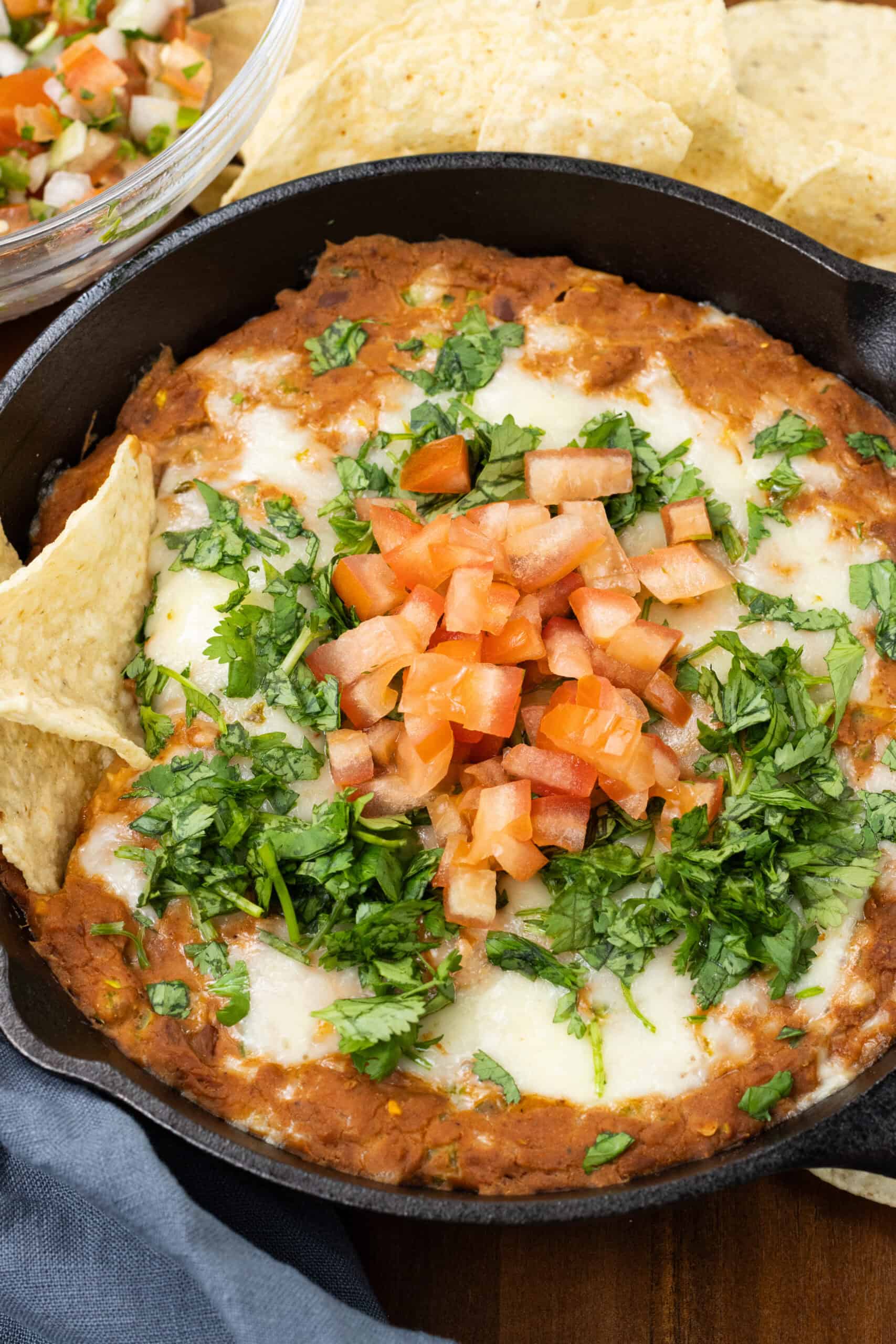 Spicy Refried Bean Dip Finished with chips and pico de Gallo