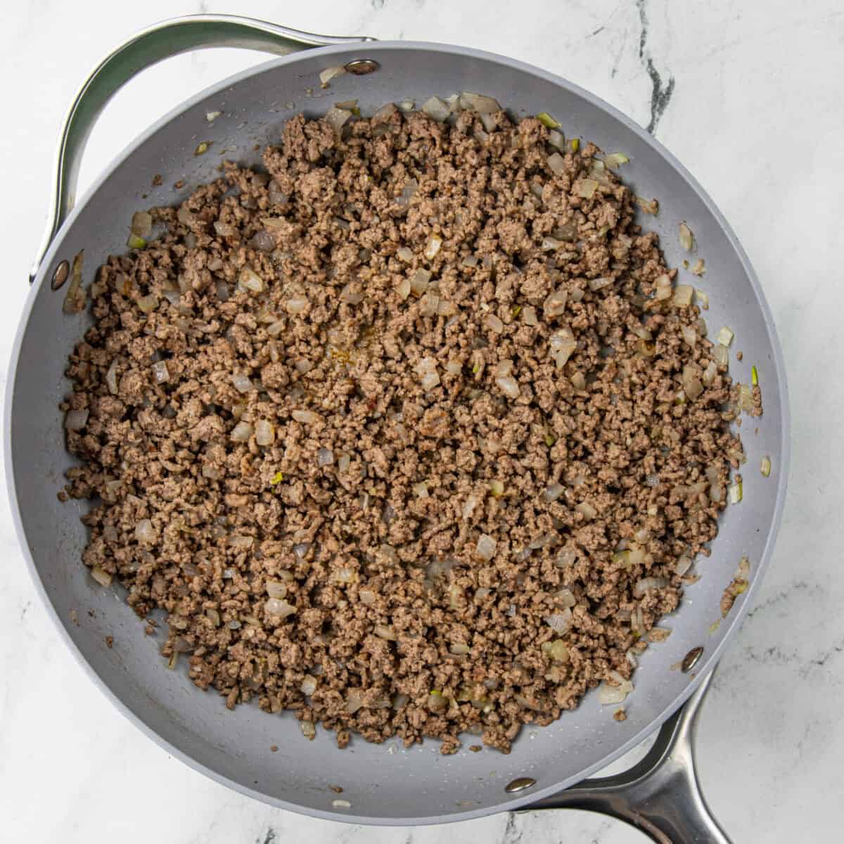 cooking ground beef in a pan