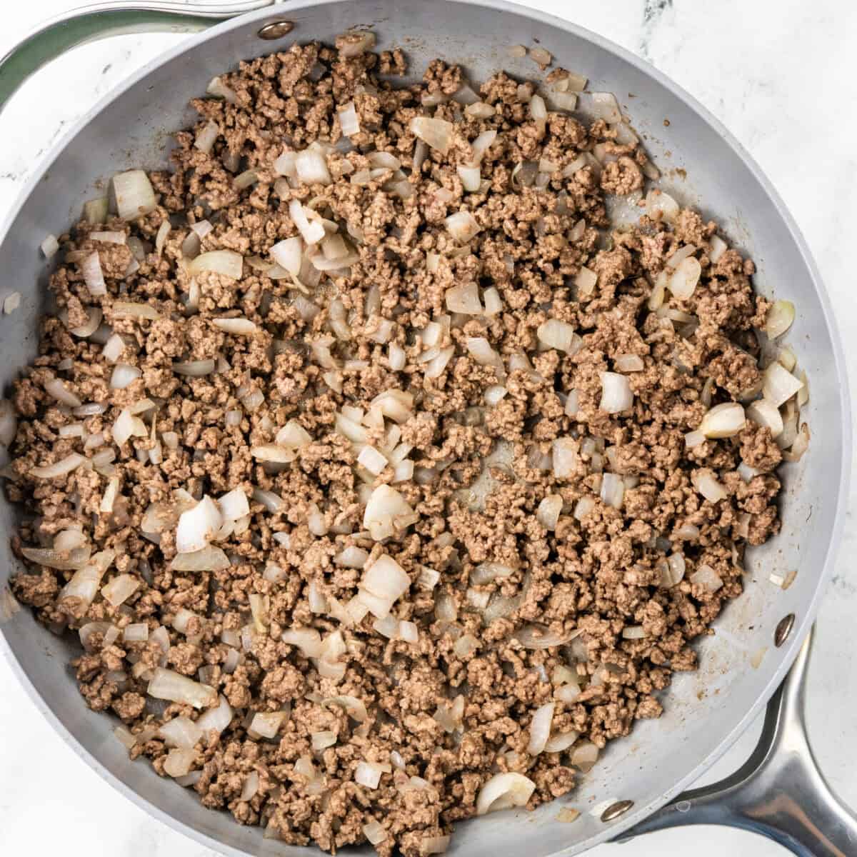 cooking beef with onions for 30 Minute One Pan Beef Enchilada Skillet