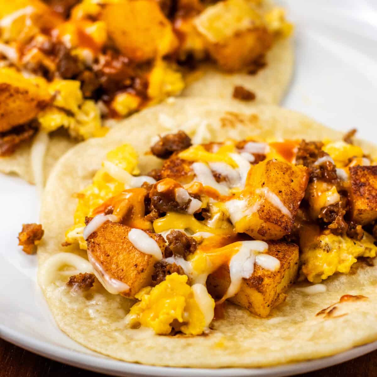 super close up of finished Chorizo Potato Egg and Cheese Breakfast Tacos