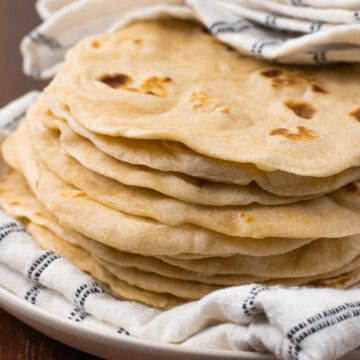 very close shot of flour tortillas from side