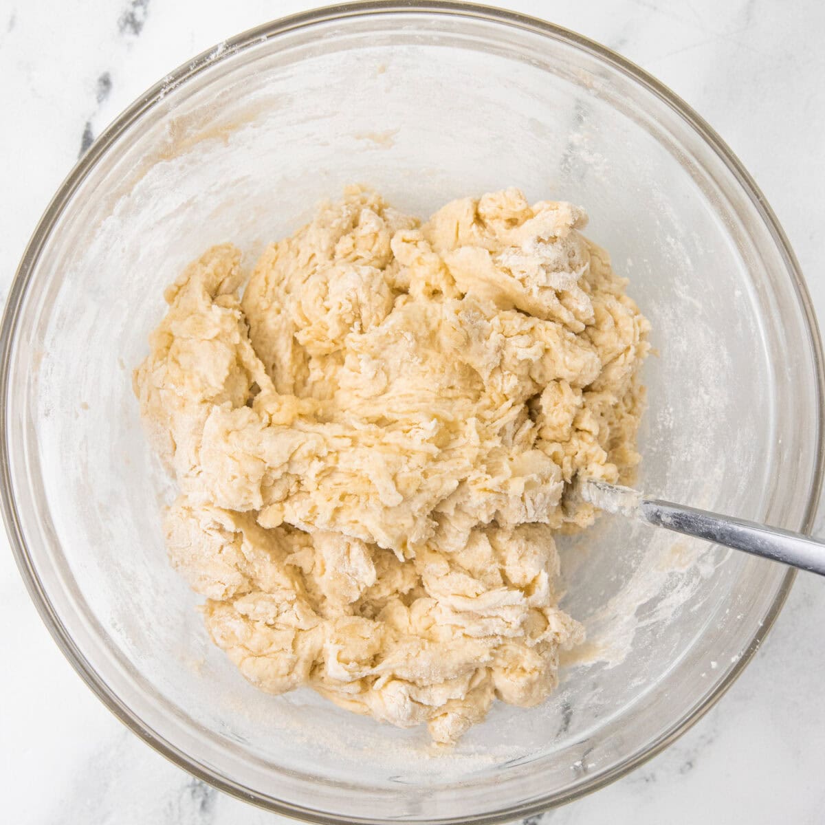 mixing ingredients for flour tortillas recipe