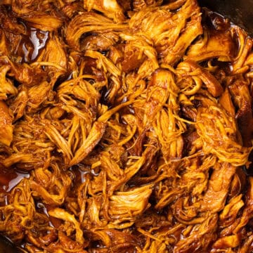 finished close up of Slow Cooker BBQ Chicken in crockpot