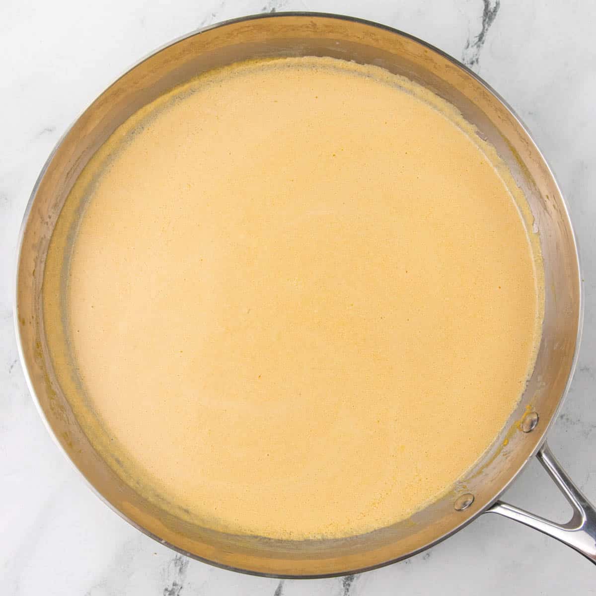 making pumpkin alfredo sauce
